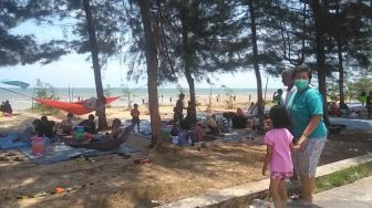 Aturan Baru, Pengunjung Pantai Manggar Bakal Wajib Pakai Pedulilindungi