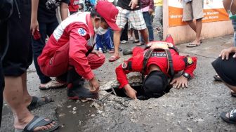 Bocah 3 Tahun Hanyut saat Main Hujan di Bandar Lampung