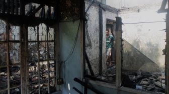 Suasana di Perumahan Jatimulya pasca kebakaran, Bekasi Timur, Senin (17/5/2021).  [Suara.com/Dian Latifah]