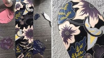 Unik, Perempuan Asal Malaysia Melukis Motif Batik di Skateboard