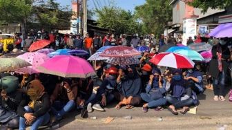 Terungkap, Masih Banyak Buruh Tetap Masuk Kerja Meski Dinyatakan Terpapar Positif Covid-19