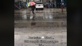 Viral Warganet Pergoki Pria Gendong Pasangan di Tengah Hujan, Publik Iri Berjamaah