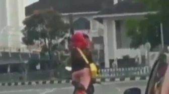 Viral Pemotor Wanita Joget di Lampu Merah, Polisi: Tak Baik untuk Ditiru