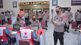 Vaksinasi Covid-19 Massal yang Digelar Polda Lampung Lebihi Target