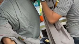 Kocak, Polisi Ini Sampai Rela Buka Baju demi Bocah di Warung Makan