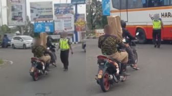 Viral Pemotor 'Sakti' Tanpa Helm dan Plat Bebas Melenggang, Picu Spekulasi Liar Warganet