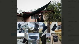 Protes Pemerintah Tak Becus Tangani Covid-19, Warga Malaysia Kibarkan Bendera Hitam