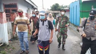 Forkopimcam Batui Gelar Menyemprotan Cairan Disinfektan di Rumah Ibadah