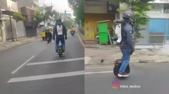 Viral Pria 'Motoran' Dengan Satu Roda, Nggak Pakai Rem dan Setang Bikin Melongo