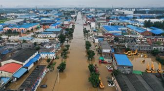 Banjir Bandang Landa Kota Wisata Di China, 7 Orang Tewas