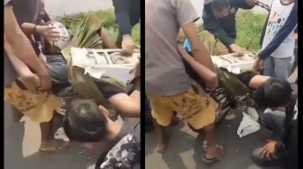 Viral Tubuh Seorang Pria Tersangkut di Sepeda Motor, Kok Bisa?