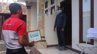 Bantu Warga Bali, JNE dan Maharani Kemala Foundation Kirimkan Paket Isoman Gratis