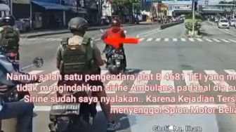 Viral Pria Berseragam Cokelat Halangi Ambulans yang Bawa Pasien Kritis, Publik Geram