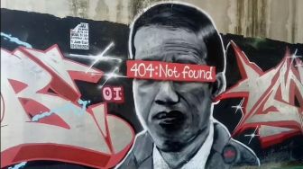 Viral di Tangerang Mural Jokowi 404:Not Found Jadi Kaos, Pembuatnya Ditangkap Polisi