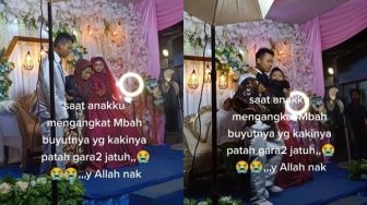 Momen Haru Pengantin Pria Gendong Nenek di Pelaminan, Reaksi Istri Bikin Salfok