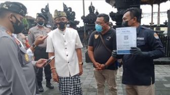 Wisatawan yang akan Plesiran ke Tanah Lot Kini Wajib Akses Aplikasi Pedulilindungi