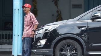 Fakta Unik Presiden Jokowi, Pernah Dorong Mobil Mogok Saat Diterjang Banjir