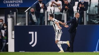 Pemain depan Juventus Federico Chiesa merayakan golnya setelah mencetak gol selama pertandingan sepak bola Grup H Liga Champions UEFA antara Juventus melawan Chelsea di Juventus Stadium, Kamis (30/9/2021) dini hari WIB.  Marco BERTORELLO / AFP
