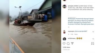 Warga Menggunakan Perahu, Banjir di Paser Semakin Parah, Warganet: Hutannya Masih Ada?