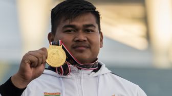 Rafika Putra Pecahkan Rekor PON Saat Sabet Emas Lontar Martil