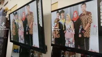 Kelewat Kreatif, Ayah Bikin Bingkai Foto Pakai TV: Maling Nangis Lihat Ini