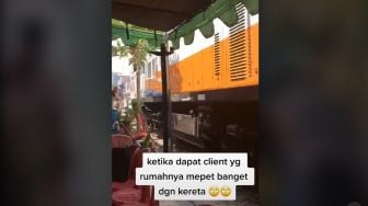 Alamak! Tenda Hajatan di Samping Rel Kereta Api, Bikin Warganet Deg-degan