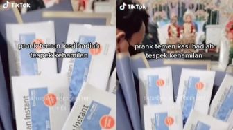 Viral Pengantin Wanita Diberi Hadiah Test Pack di Pelaminan, Reaksinya Disorot