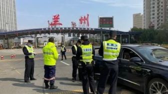 Dua Daerah di China Lockdown, Ribuan Wisatawan Terlantar