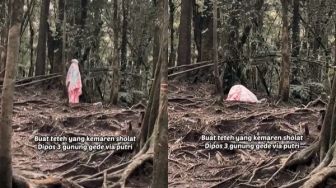 Viral Video Cewek Salat Sendirian di Tengah Hutan, Warganet: Alam Pun Senang