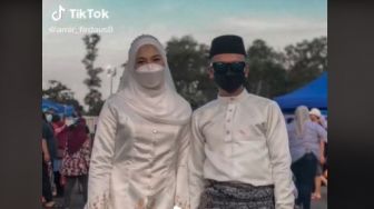 Anti Mainstream! Viral Pengantin Ini Langsung ke Pasar Malam setelah Sah Menikah