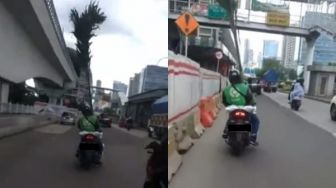 Viral Driver Ojol Bawa Orderan Pohon Super Tinggi Naik Motor, Publik Emosi