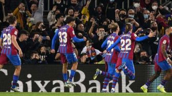 Debut Xavi Hernandez, Barcelona Kalahkan Espanyol 1-0