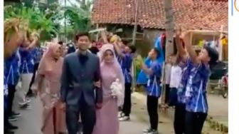 Momen Pemain Voli Menikah Viral, Bukan Pedang Pora tapi Passing Atas