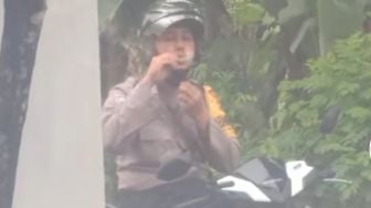 Viral Polisi Main Gelembung Sabun di Jalan, Warganet:  Bahagia itu Sederhana