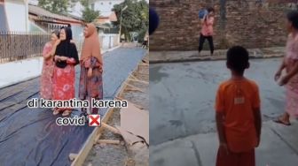 Bukan Karantina Covid, Warga Dikarantina karena Cor-Coran Jalan Belum Kering