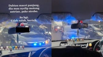 Sedan Lawan Arah Terobos Kemacetan Pakai Strobo, Dipaksa Mundur Ganggu Pengemudi Lain