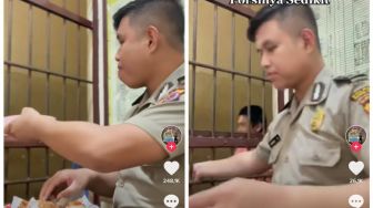 Viral! Polisi Ini Bikin Warganet Kagum usai Bagikan Makanan Gratis untuk Tahanan