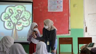 Millenial Jamkrindo Tanamkan Perilaku Hidup Sehat ke Pelajar di Geopark Ciletuh