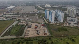 Foto udara Rumah Susun Nagrak di Cilincing, Jakarta, Senin (20/12/2021). [Suara.com/Angga Budhiyanto]