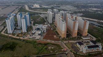 Foto udara Rumah Susun Nagrak di Cilincing, Jakarta, Senin (20/12/2021). [Suara.com/Angga Budhiyanto]