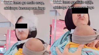 Awalnya Hampir Kena Hujat, Aksi Perempuan Gendong Anak Penuh Kepulan Asap Berakhir Ngakak