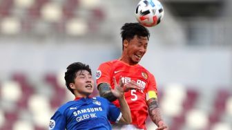China Larang Pemain Sepak Bola Bertato, Ini Alasannya