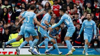 Guardiola Tegaskan Manchester City Masih Termotivasi Raih Double Winner