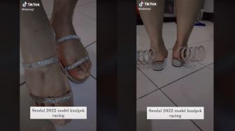 Tren Sepatu 2022, Aksi Wanita Pakai Sandal Model Knalpot Ini Bikin Warganet Bingung