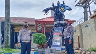 Unik, Knalpot Brong Hasil Sitaan Polisi Disulap Menjadi Robot Transformers
