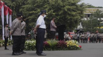 Kapolri Jenderal Listyo Sigit Prabowo memberikan sambutan saat upacara peresmian tim Perintis Presisi Polda Metro Jaya di Lapangan Presisi Polda Metro Jaya, Jakarta, Kamis (13/1/2022). [Suara.com/Angga Budhiyanto]