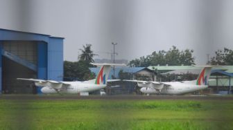 Pesawat terparkir di Bandara Pondok Cabe, Tanggerang Selatan, Banten, Rabu (26/1/2022). [Suara.com/Septian]
