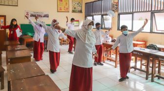 Anak Usia 6-11 Tahun Belum Vaksin di Pekanbaru Dilarang Belajar Tatap Muka