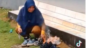 Viral Aksi Guru Bakar Sepatu Siswa Tak Sesuai Aturan, Netizen Emosi: Gak Harus Dibakar Juga Bu!