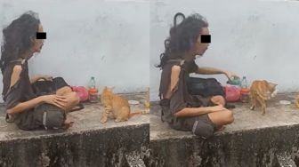 Walau Bajunya Compang-camping, Pria Tunawisma Ini Bikin Publik Terenyuh Usai Terekam Berbagi Makanan dengan Kucing Liar